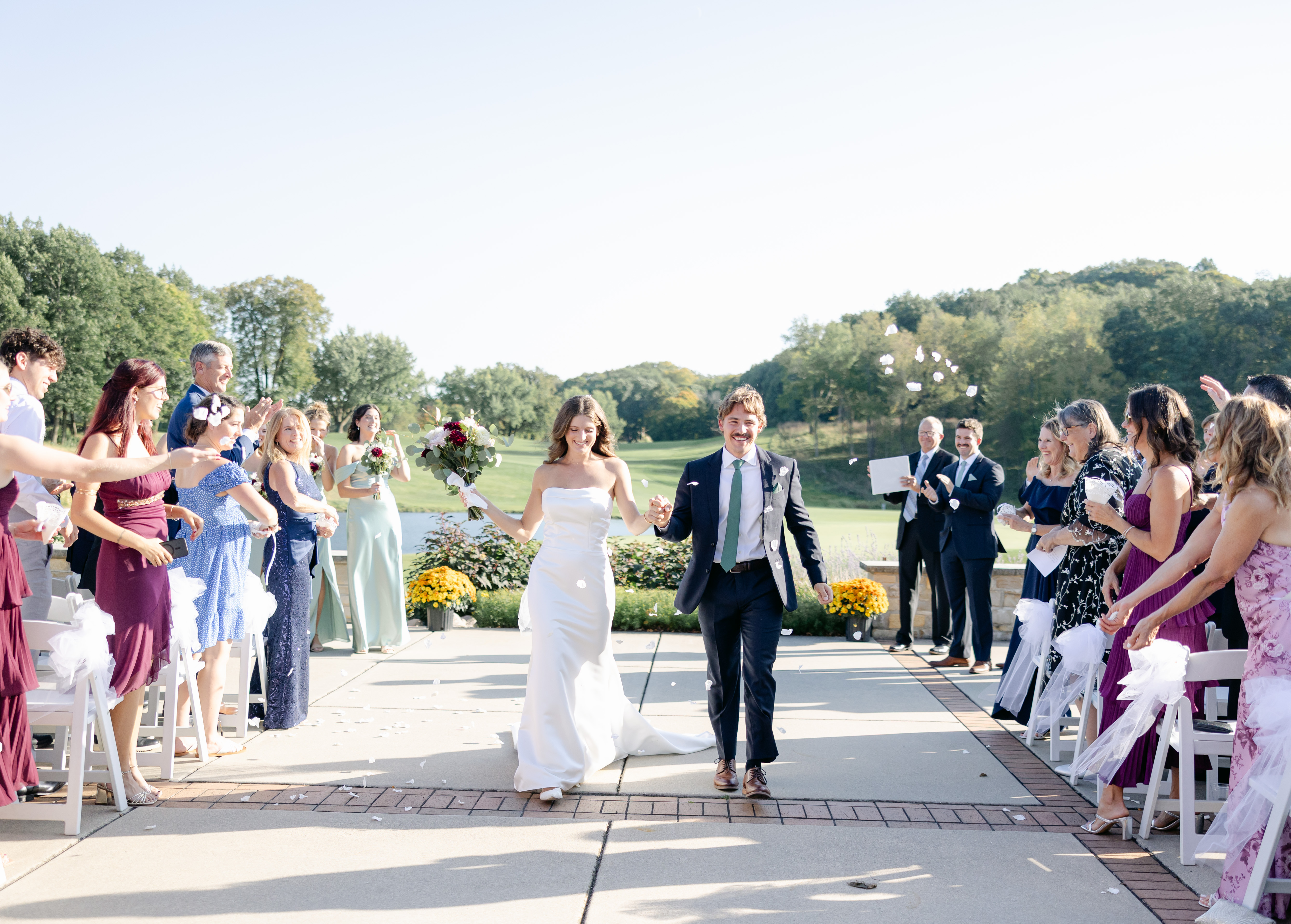 Hunter and Lauren walking down the aisle
